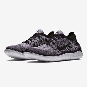 Nike Women's Black and White Flyknit Running Shoes